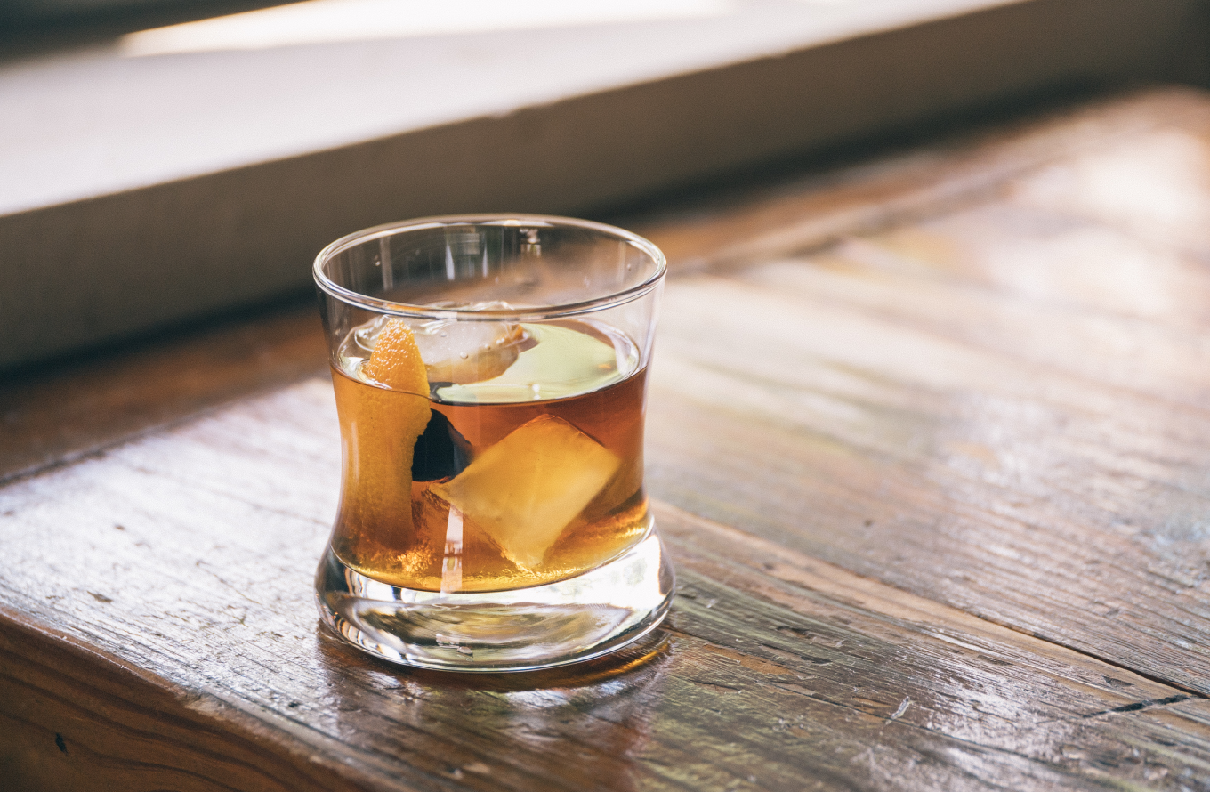 Old fashioned cocktail on wood table